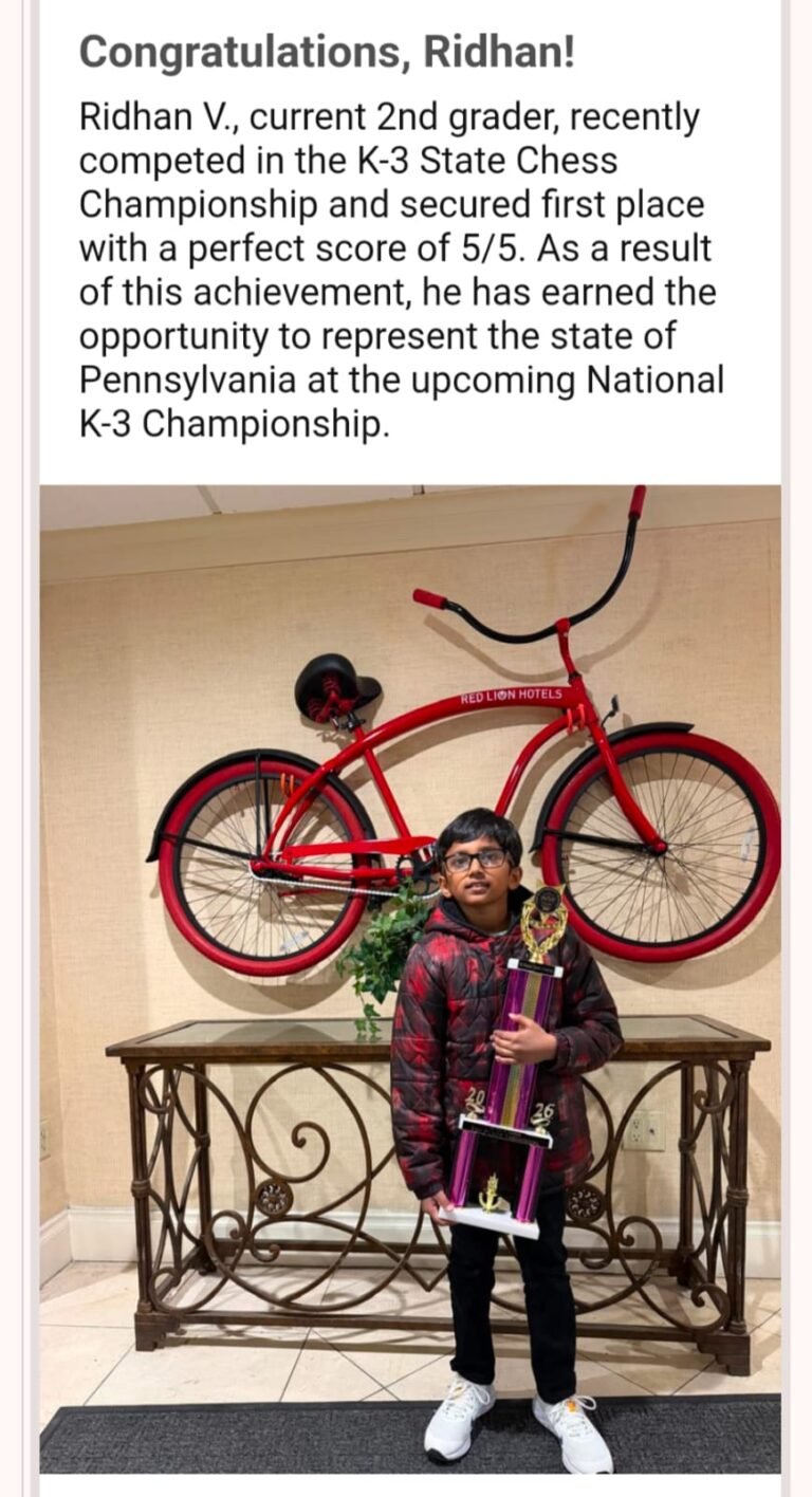School article featuring Ridhan V., a 2nd grader holding his trophy after winning 1st place with a perfect 5/5 at the Pennsylvania K-3 State Chess Championship
